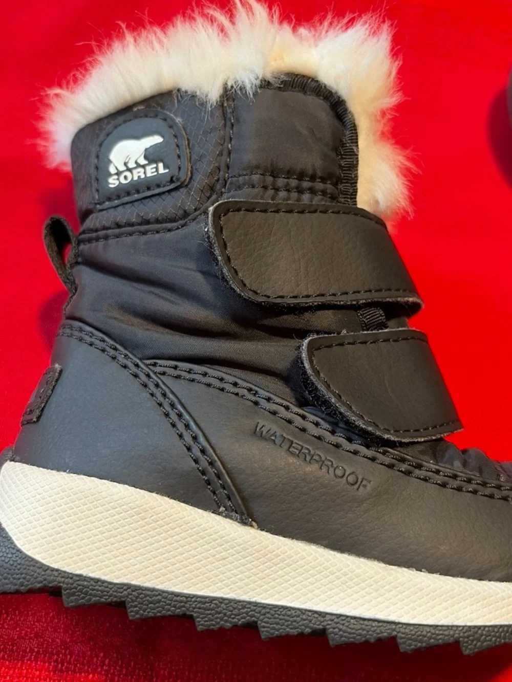 Sorel Black Kids Snow Boots with White Faux Fur Cuff
